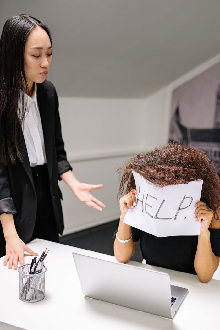 services-02 An office scene depicting stress and pressure with a dramatic help sign.